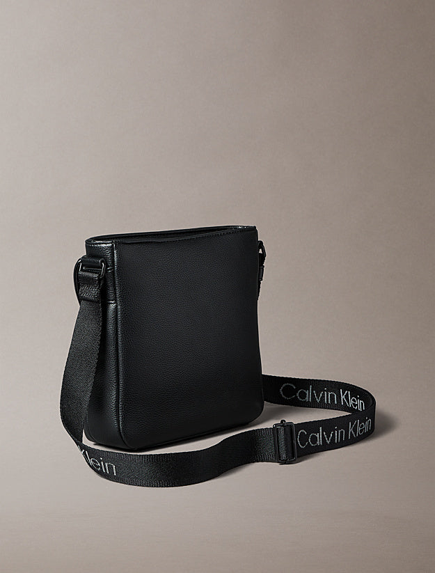 CALVIN KLEIN WEBBING STRAP FLIGHT BAG