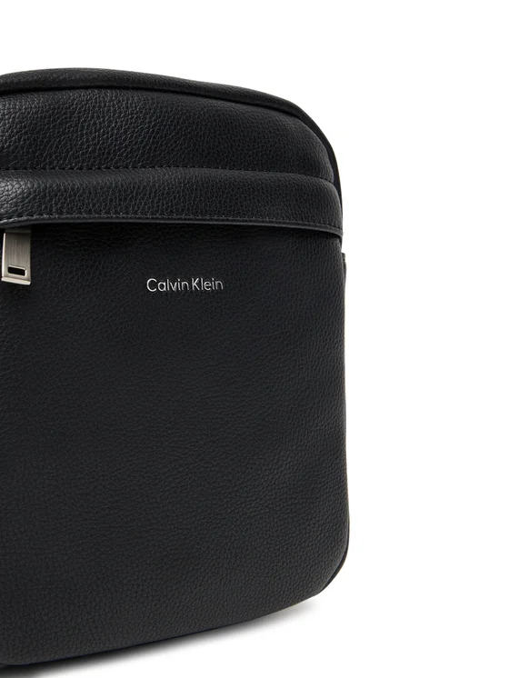 CALVIN KLEIN RAISED REPORTER